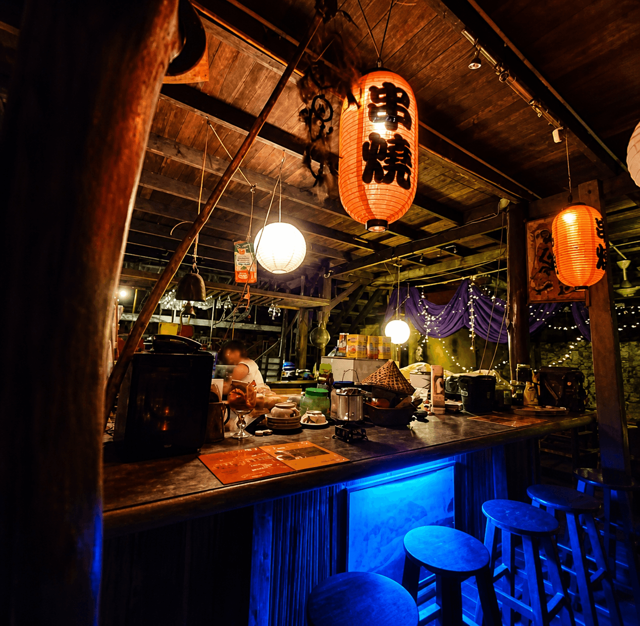Lantern-lit gathering space